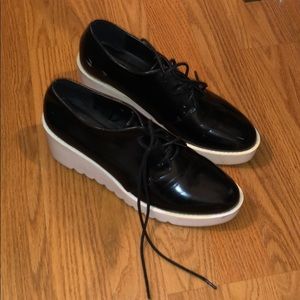 Retro black and white platform loafers